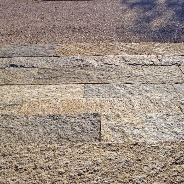The image shows this product being used in a patio pavers application.