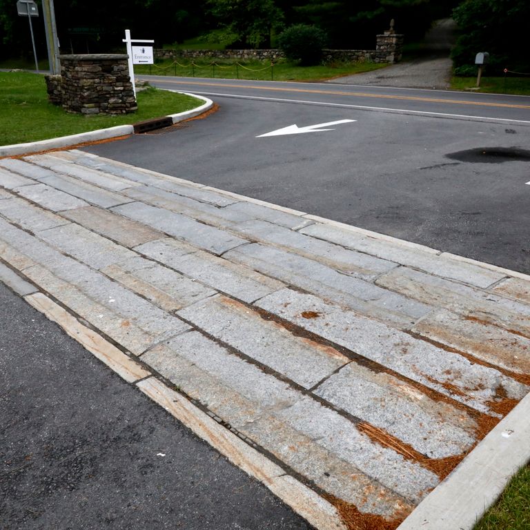 Application image for Reclaimed Granite Curbstone - Driveway Apron. The image shows this product being used in a driveway aprons application.