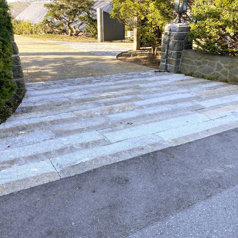 The image shows this product being used in a driveway aprons application.