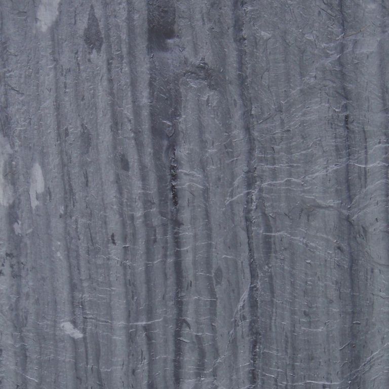 Swatch image cropped for Vermont Slate Striated Gray - Roof Shingles. The surface finish shown is natural cleft. Dominant colors shown are blue and gray; with green and purple secondaries. Exhibits 