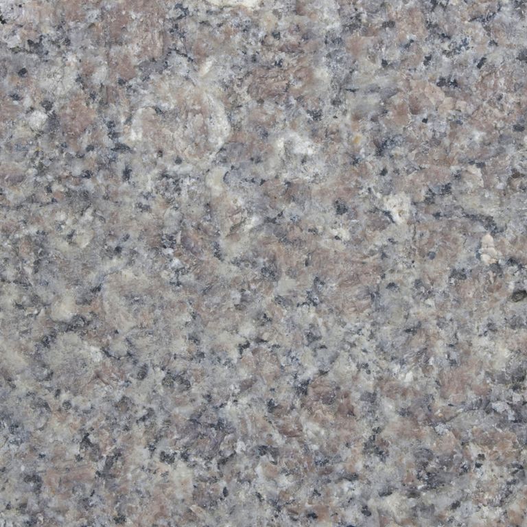 Color/Finish variation image for Reclaimed Granite Curbstone - Pool Coping. The dominant color shown is gray; with black, green, purple and white secondaries. The color mix creates a cool feeling. Coarse speckled color pattern. Contains some mica and mineral inclusions.