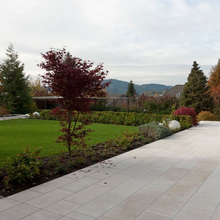 The image shows this product being used in a path pavers application.