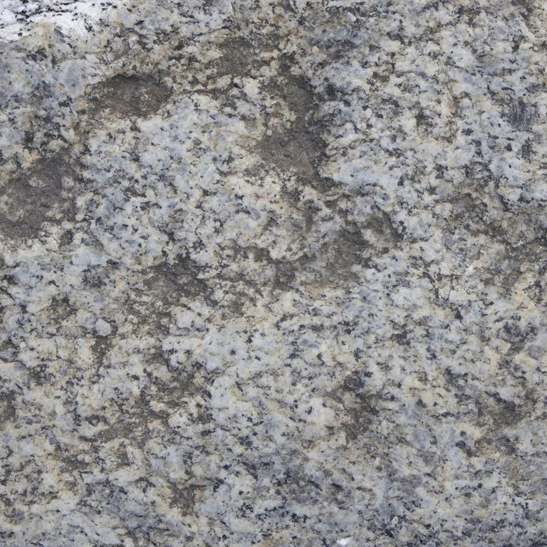 Color/Finish variation image for Reclaimed First Generation Granite Curbstone Plank Pavers. The dominant color shown is gray; with beige, blue, brown, green and white secondaries. Exhibits 