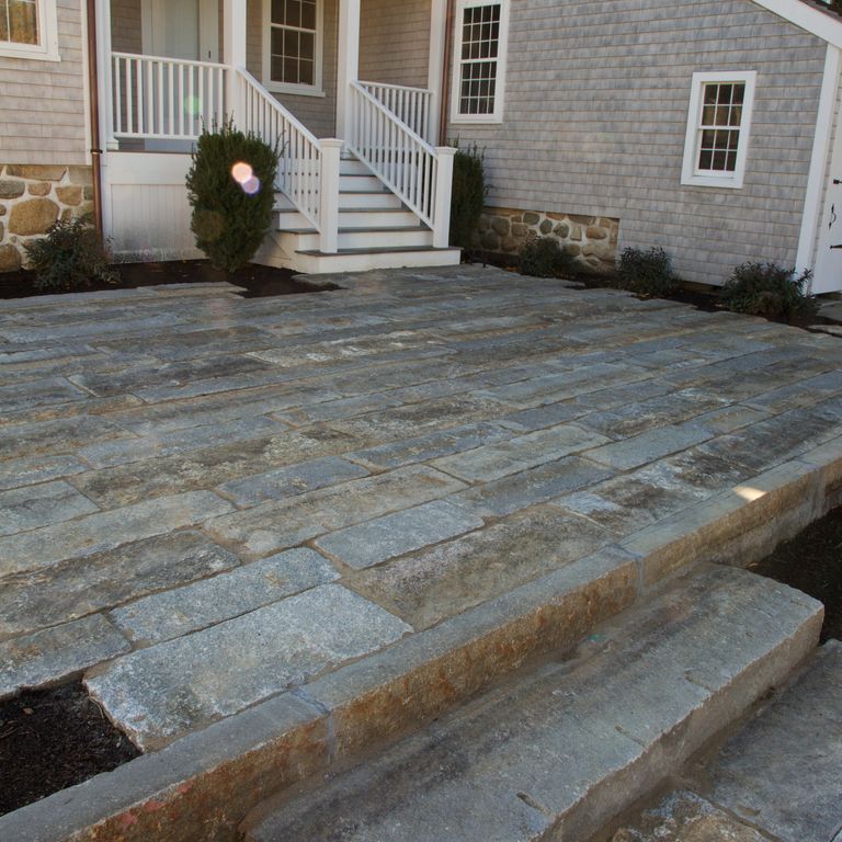 The image shows this product being used in a patio pavers application.