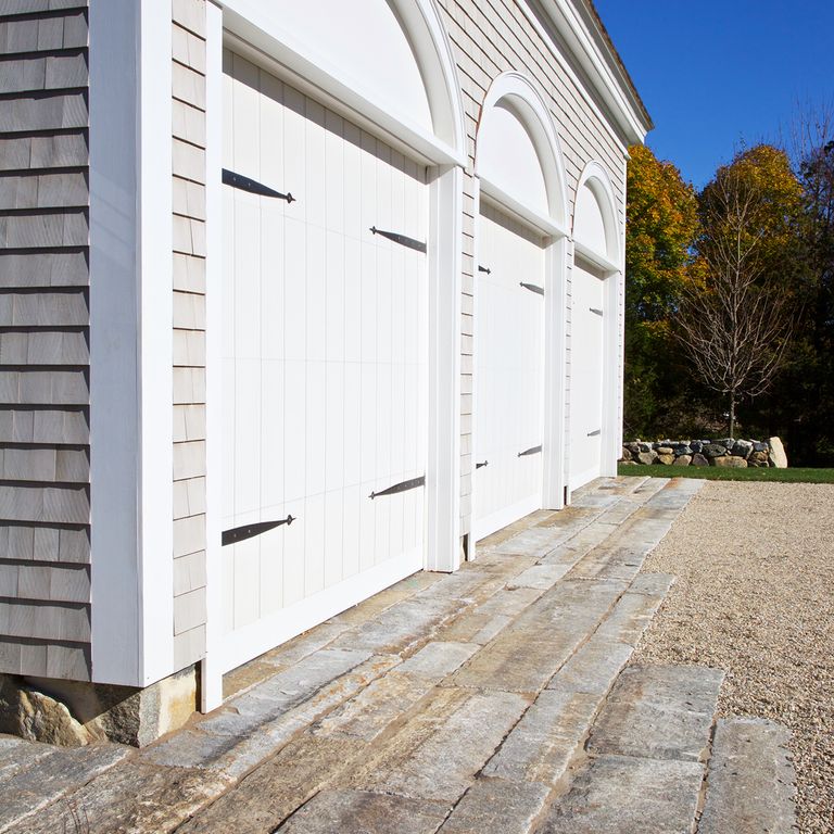 The image shows this product being used for driveway pavers and driveway aprons.