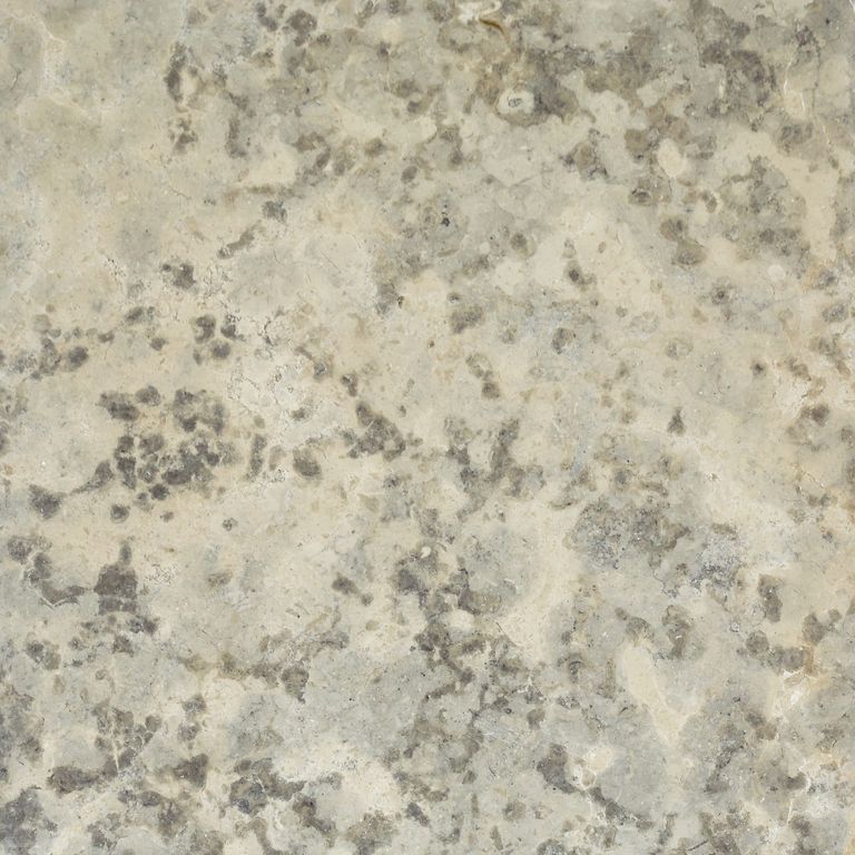 Close-up image for Mountain Hard Limestone Blue - Interior Flooring. The surface finishes shown are honed and polished. Dominant colors shown are beige and tan; with blue, brown, gray, white and cream secondaries. Exhibits 