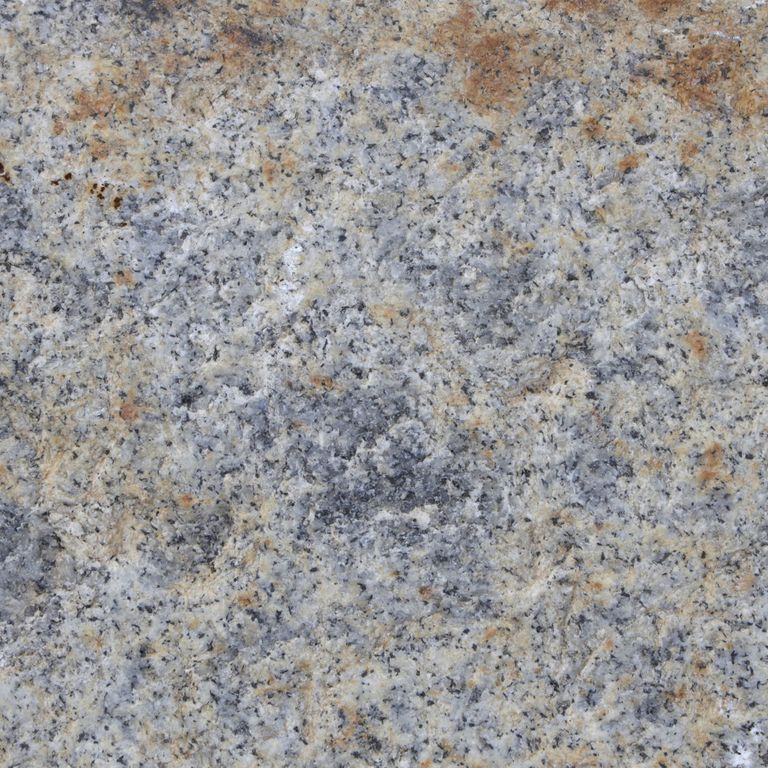 Color/Finish variation image for Reclaimed First Generation Granite Curbstone Edging. The dominant color shown is gray; with beige, blue, brown, orange/rust, white and tan secondaries. Speckled, fine speckled, blotched and cloudy color patterns. Contains mineral inclusions.