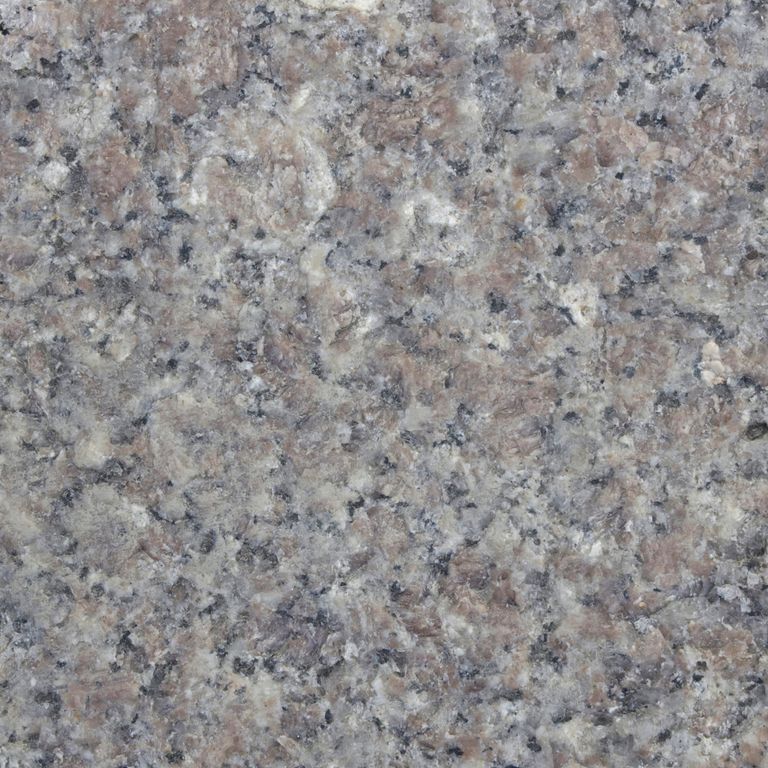 Color/Finish variation image for Reclaimed First Generation Granite Curbstone Edging. The dominant color shown is gray; with green and purple secondaries. The color mix creates a cool feeling. Coarse speckled color pattern. Contains mineral inclusions.