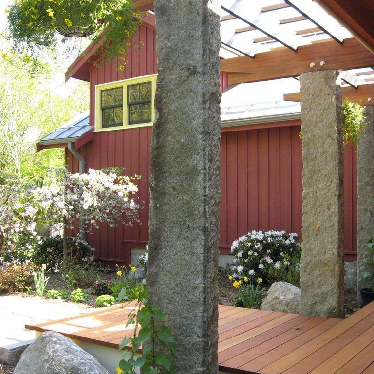 Application image for Reclaimed Granite Columns. The image shows this product being used in a columns application. This is a landscape stone for outdoor commercial and residential applications. Suitable for general use situations. Moderate to high on the price spectrum.
