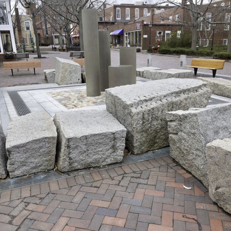 Application image for Granite - Reclaimed Block - Benches. The image shows this product being used in a seating & benches application. This is a landscape stone for outdoor commercial and residential applications. Suitable for general use, freeze-thaw conditions, low heat absorption surfaces and low slipperiness surfaces situations. Relatively higher in price.
