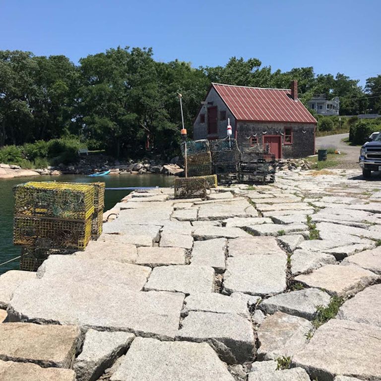Application image for Reclaimed Granite Block - Pavers. The image shows this product being used in a patio pavers application. The surface finish shown is . The dominant color shown is gray.