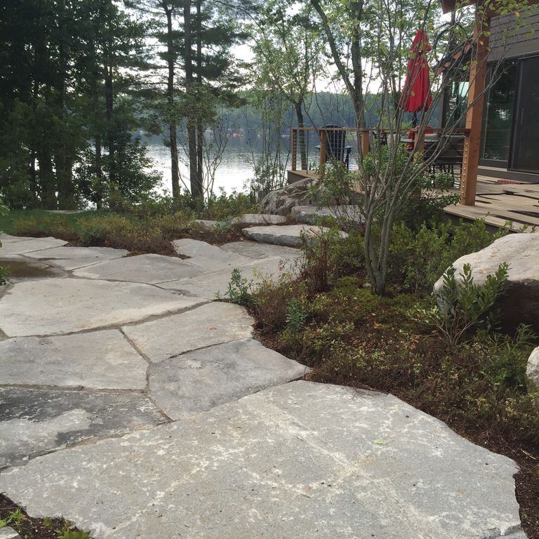 The image shows this product being used for path pavers and patio pavers.