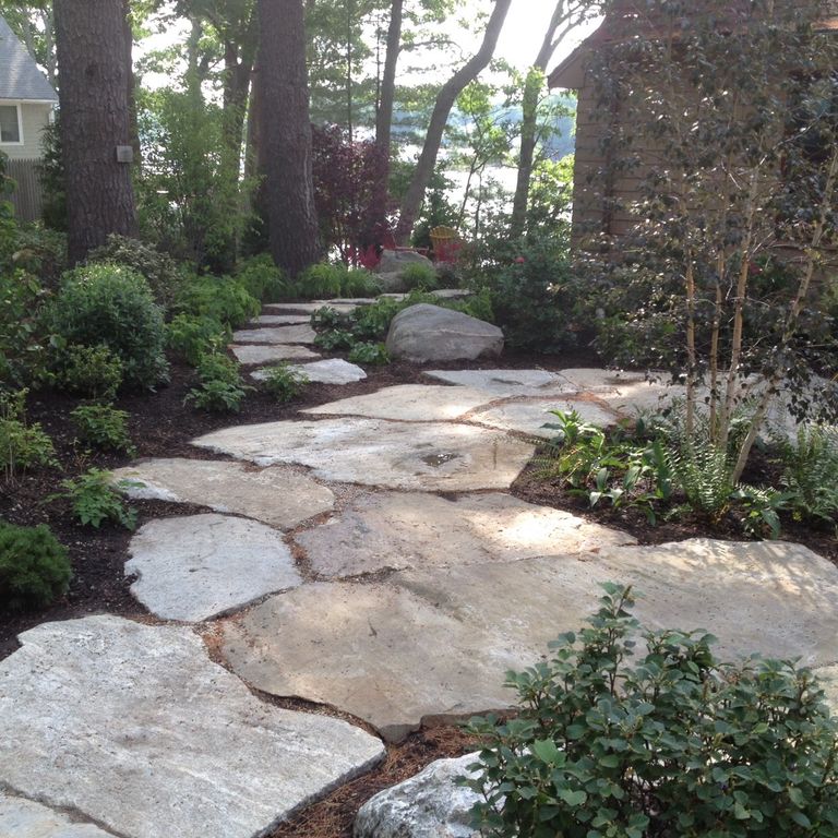 The image shows this product being used for path pavers and patio pavers.