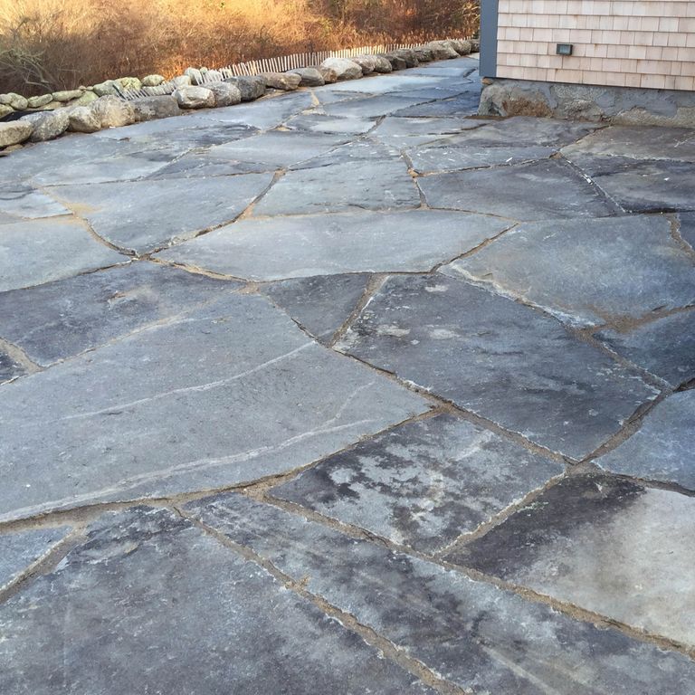 The image shows this product being used in a patio pavers application.