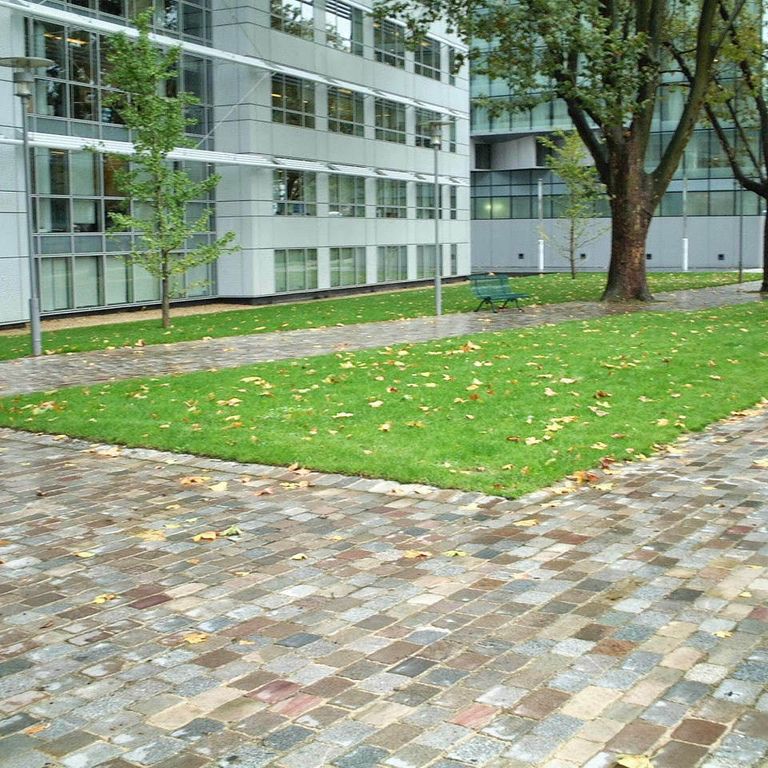 The image shows this product being used in a path pavers application.