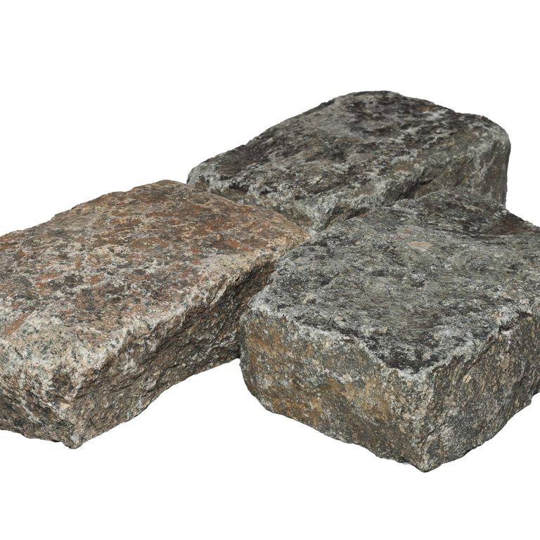 Oblique image for Reclaimed European Porphyry Cobblestones - Rectangle - Worn Surface. The surface finish shown is . Dominant colors shown are brown and gray. The color mix creates a warm feeling.