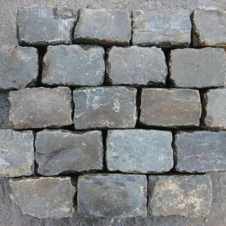 Application image for Reclaimed European Sandstone Cobblestones - Rectangle - Worn Surface. The surface finish shown is . The dominant color shown is gray. The color mix creates a cool feeling.