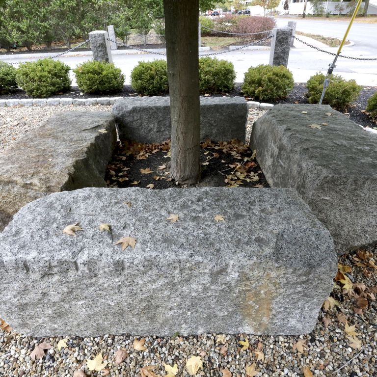 Application image for Reclaimed Granite Bridge Blocks - Benches and Seating. The image shows this product being used in a seating & benches application. This is a landscape stone for outdoor commercial and residential applications. Suitable for general use, freeze-thaw conditions, low heat absorption surfaces and low slipperiness surfaces situations. Relatively higher in price.