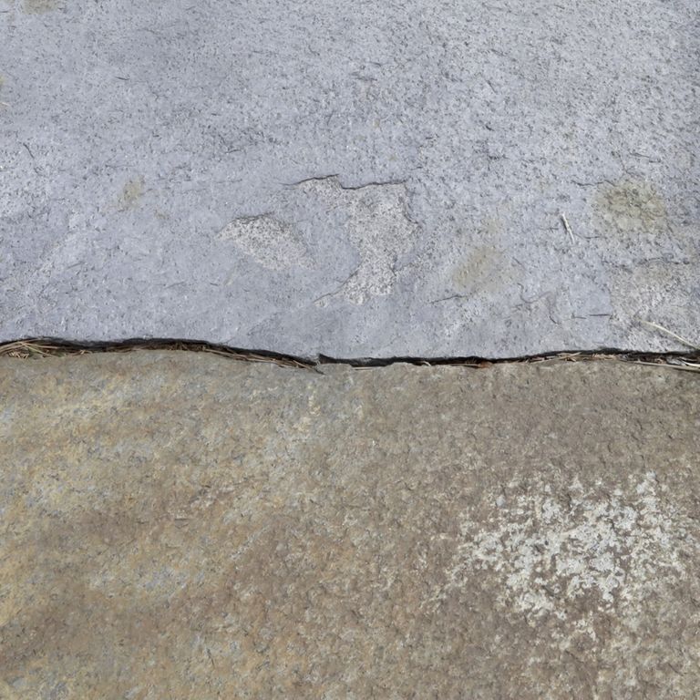 Color/Finish variation image for Goshen Stone - Irregular Flagstone. The dominant color shown is gray; with blue, brown, green, orange/rust, purple, white and tan secondaries. Random, blotched and cloudy color patterns.