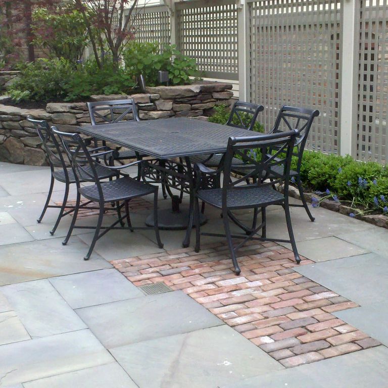 The image shows this product being used in a patio pavers application.