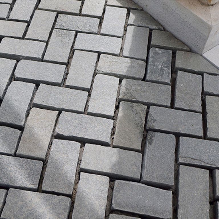 Application image for Quartzite - Greek Slate - Grey - Cobblestones. The dominant color shown is gray. The color mix creates a cool feeling.