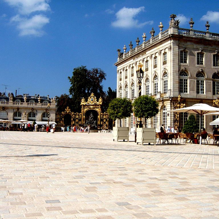 Feature image for Limestone - Mountain Hard - Cobblestones Mix. The image shows this product being used in a public area application. Dominant colors shown are beige, tan and cream; with brown, gray and white secondaries. The color mix creates a warm feeling. Fine speckled and speckled color patterns.