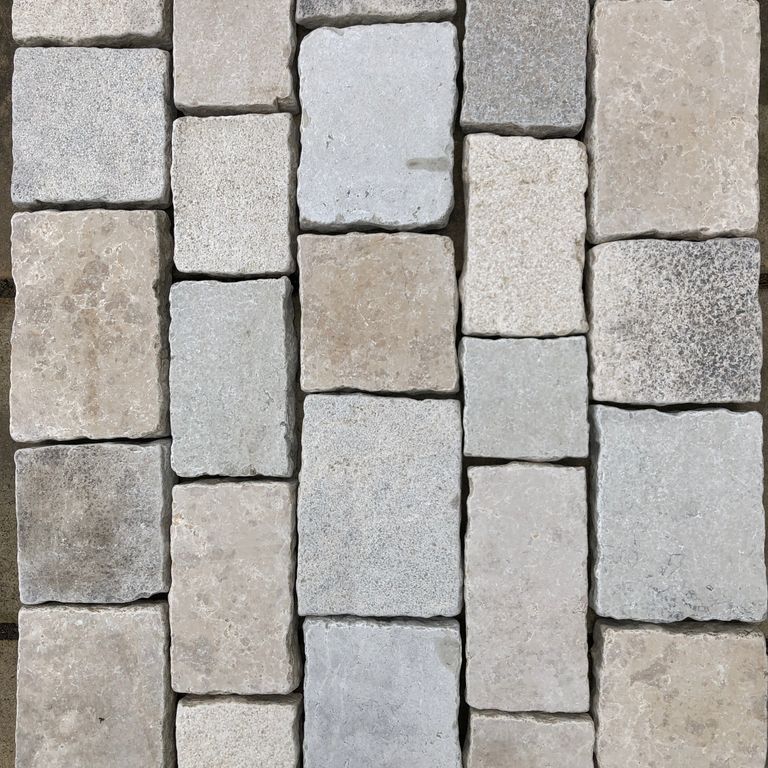 Application image for Limestone - Mountain Hard - Cobblestones Mix. Dominant colors shown are gray and tan. The color mix creates a warm feeling.