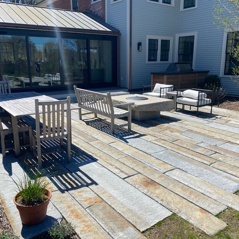 The image shows this product being used in a patio pavers application.
