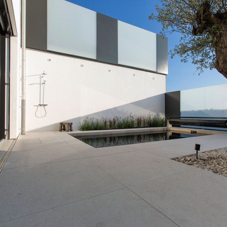 The image shows this product being used for Limestone- Mountain Hard Beige - Pool Coping.