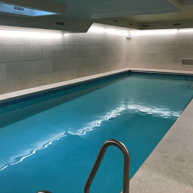 The image shows this product being used for Limestone- Mountain Hard Beige - Pool Coping.