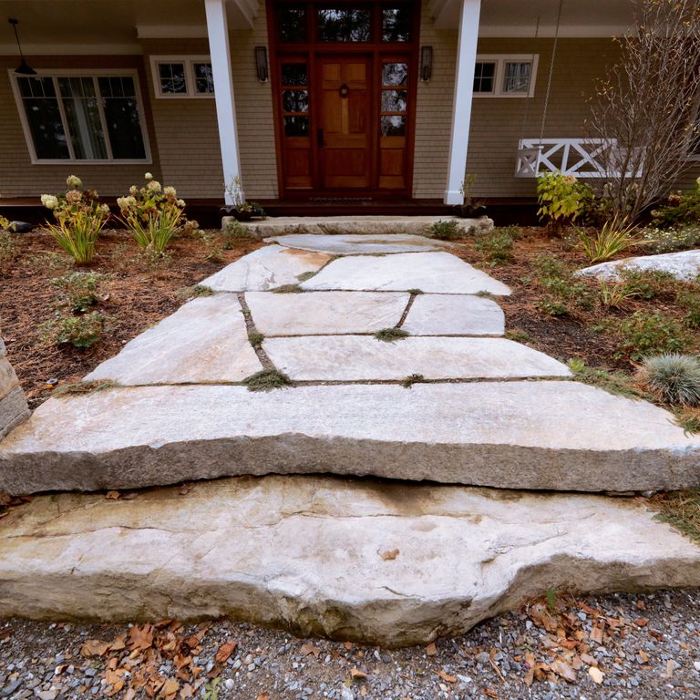 The image shows this product being used for path pavers and monolithic steps.