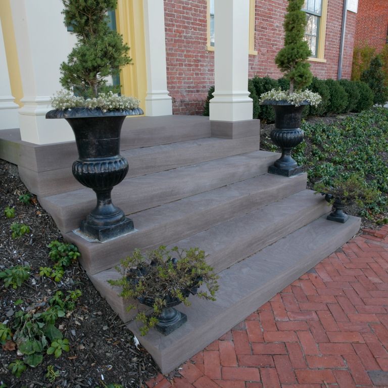 Application image for Reclaimed Brownstone Steps. The image shows this product being used in a monolithic steps application. This is a building and landscape stone for indoor and outdoor commercial and residential applications. Suitable for general use, freeze-thaw conditions, low slipperiness surfaces and high heel compatibilty situations. Relatively higher in price.