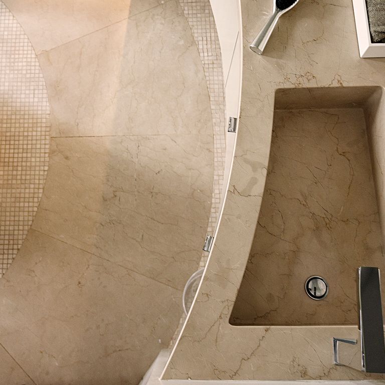 The image shows this product being used for interior floor and sinks.