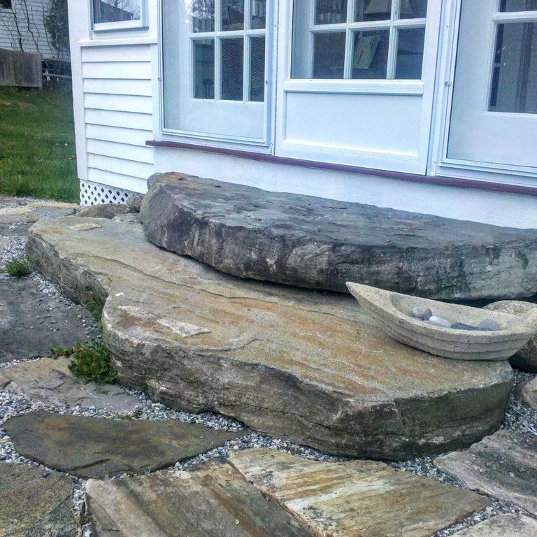 Application image for Mystic Mountain Natural - Steps & Landings. The image shows this product being used for landings and monolithic steps. This is a building and landscape stone for outdoor residential applications. Suitable for general use, freeze-thaw conditions, high traffic areas, low slipperiness surfaces and high heel compatibilty situations. Higher to high on the price spectrum.