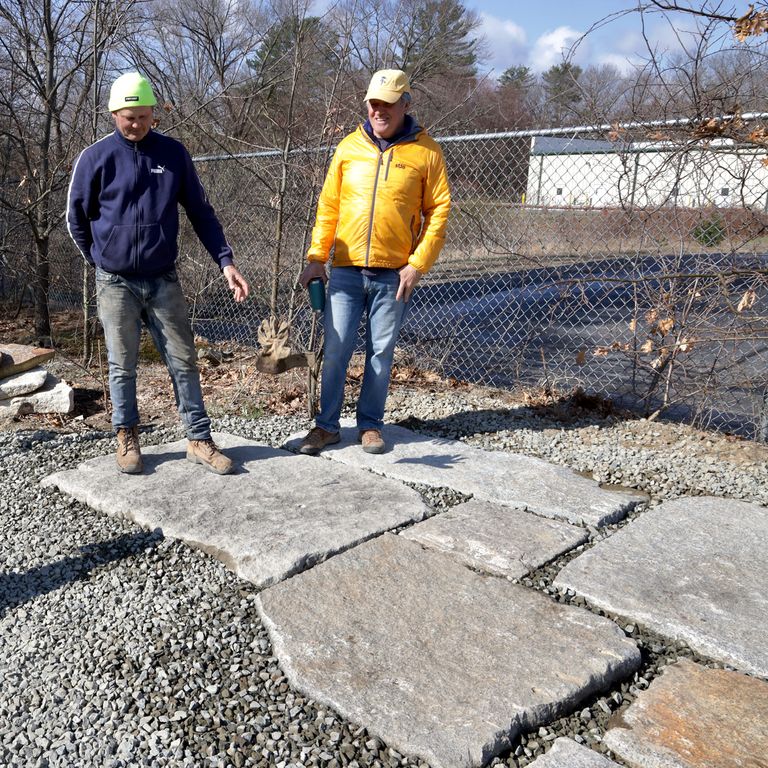 The image shows this product being used in a patio pavers application.
