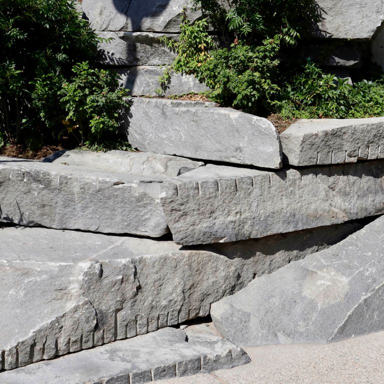 The image shows this product being used for seating & benches and landscape wallstone.