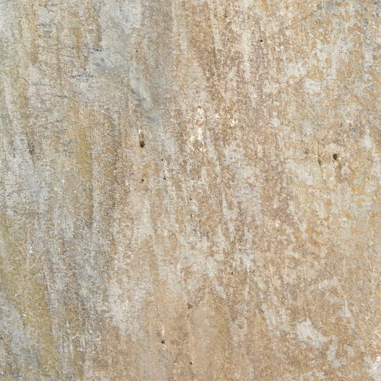 Close-up image for Mandarin Yellow Slate - Irregular Pavers. The surface finish shown is natural. Dominant colors shown are beige and tan; with brown, gray, orange/rust and cream secondaries. Exhibits 
