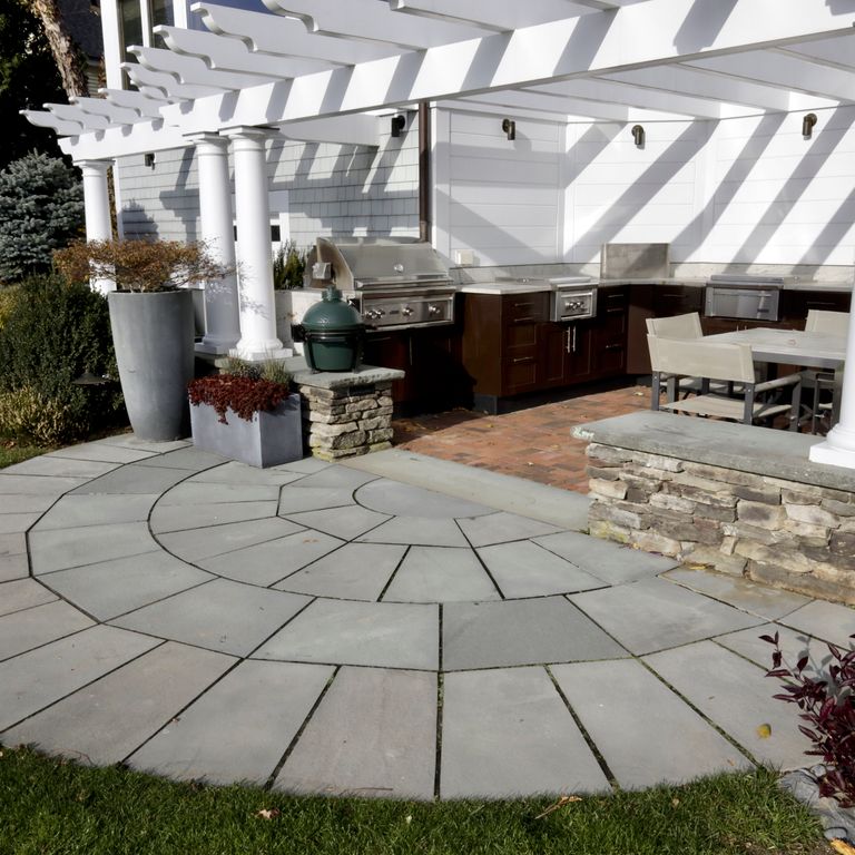 The image shows this product being used in a patio pavers application.