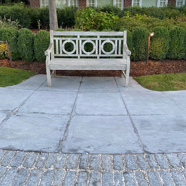 The image shows this product being used in a path pavers application.