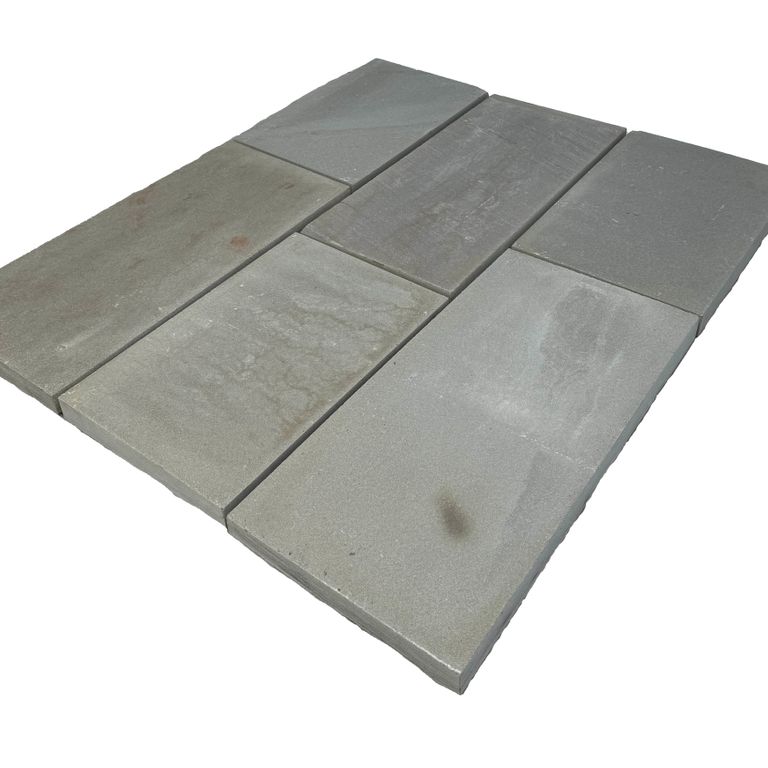 Oblique image for Bluestone - Full Color Dimensional Cut Pavers - Flamed. The surface finish shown is flamed. Dominant colors shown are blue, green and gray. The color mix creates a cool feeling.