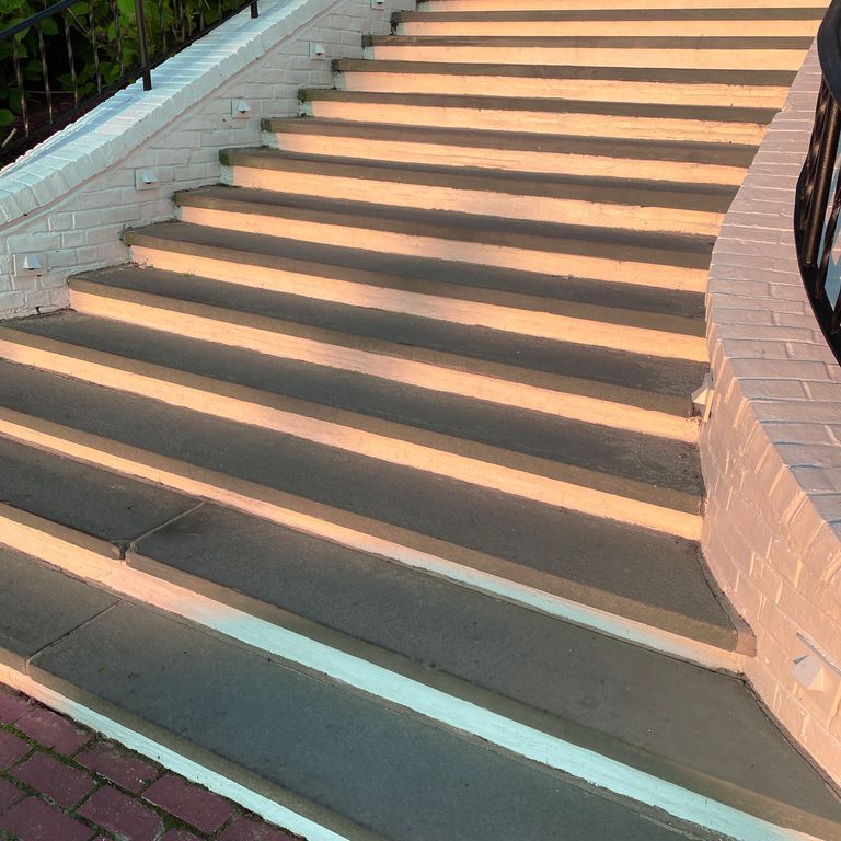 Application image for Bluestone Flamed Surface Blue/Gray - Treads. The image shows this product being used in a treads application. This is a landscape stone for indoor and outdoor commercial and residential applications. Suitable for general use, freeze-thaw conditions, high traffic areas, low slipperiness surfaces and high heel compatibilty situations. Low to moderate on the price spectrum.