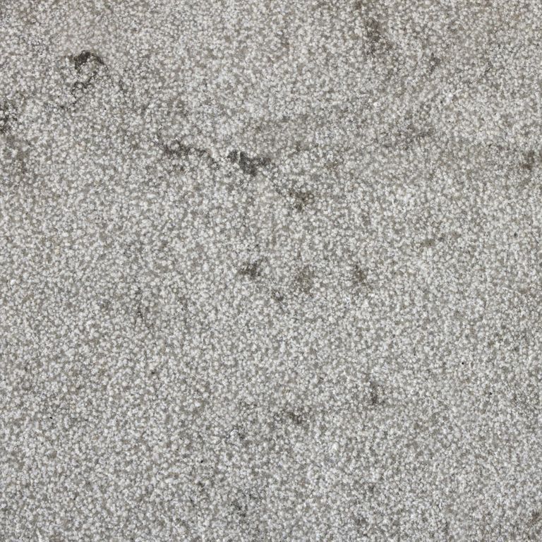 Color/Finish variation image for Limestone- Portuguese Dawn Haze - Pool Coping. The surface finish shown is bush hammered. The dominant color shown is gray; with beige, purple and white secondaries. The color mix creates a cool feeling. Random and speckled color patterns.