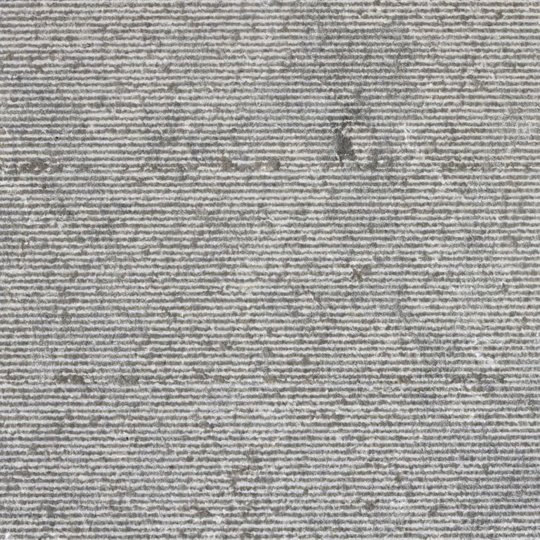 Color/Finish variation image for Limestone- Portuguese Dawn Haze - Pool Coping. The surface finish shown is grooved. The dominant color shown is gray; with beige and white secondaries. The color mix creates a cool feeling. Blotched and linear color patterns.