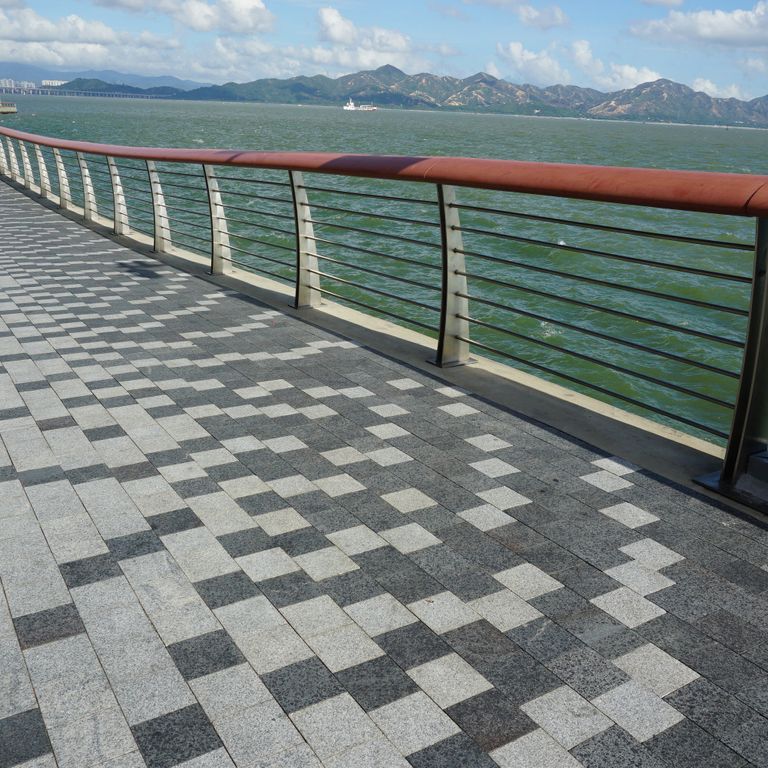 Application image for Basalt - Ankar Gray - Cobblestones. The image shows this product being used in a path pavers application. The dominant color shown is gray.