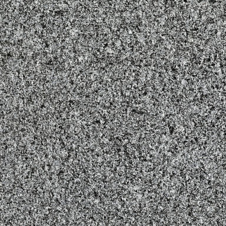 Close-up image for Granite- Republic Black - Pavers. The surface finish shown is sand blasted. Dominant colors shown are black and gray; with a white secondary. The color mix creates a cool feeling. Speckled and fine speckled color patterns.