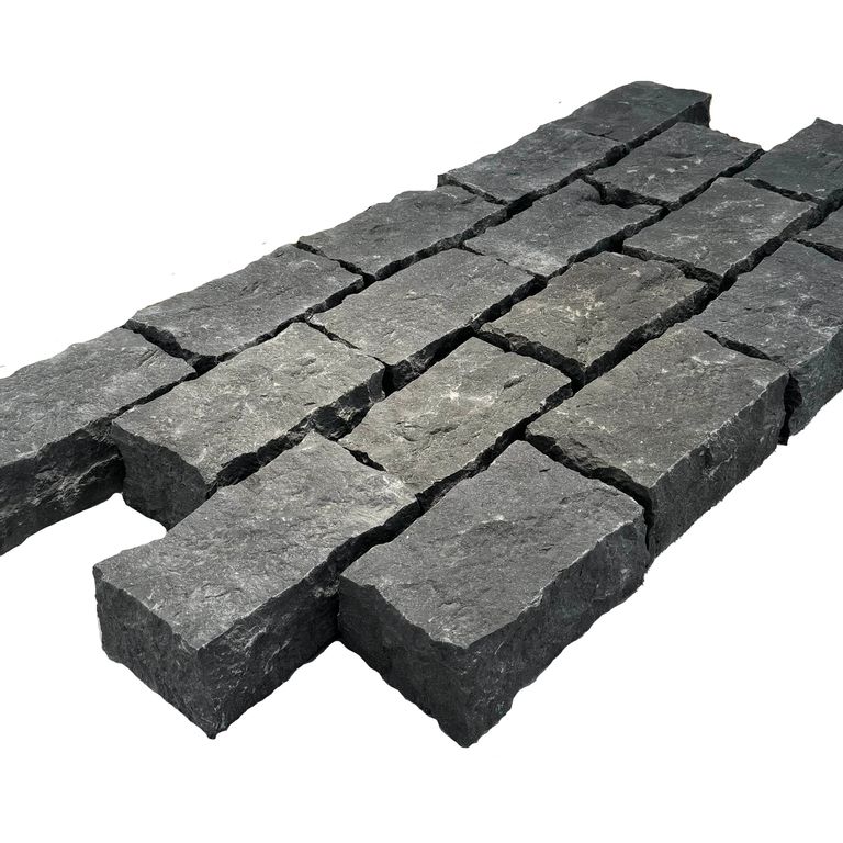 Application image for Nordic Black Basalt Cobblestones - Rectangle - Split Top, Split Sides. The surface finish shown is split-face. Dominant colors shown are black and gray. The color mix creates a cool feeling.