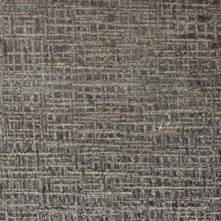 Color/Finish variation image for Ankar Black Basalt - Cobblestones. The surface finish shown is canvas. Dominant colors shown are brown and gray; with green, purple and tan secondaries. The color mix creates a warm feeling. Blotched and linear color patterns.