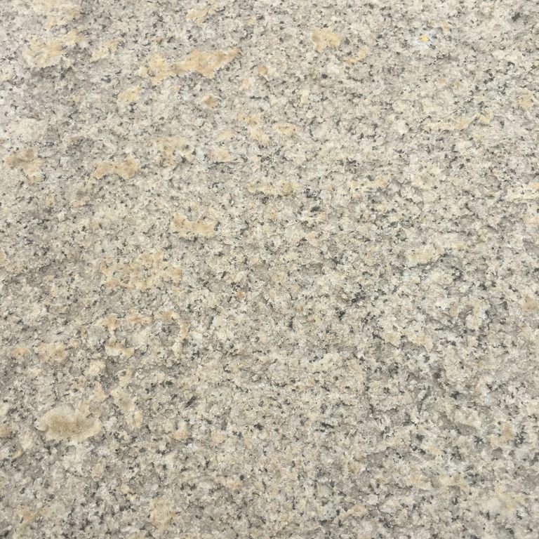 Color/Finish variation image for Granite Plank Pavers - Antiqued Surface. Dominant colors shown are beige and tan; with gray, white and cream secondaries. The color mix creates a warm feeling. Speckled and cloudy color patterns.