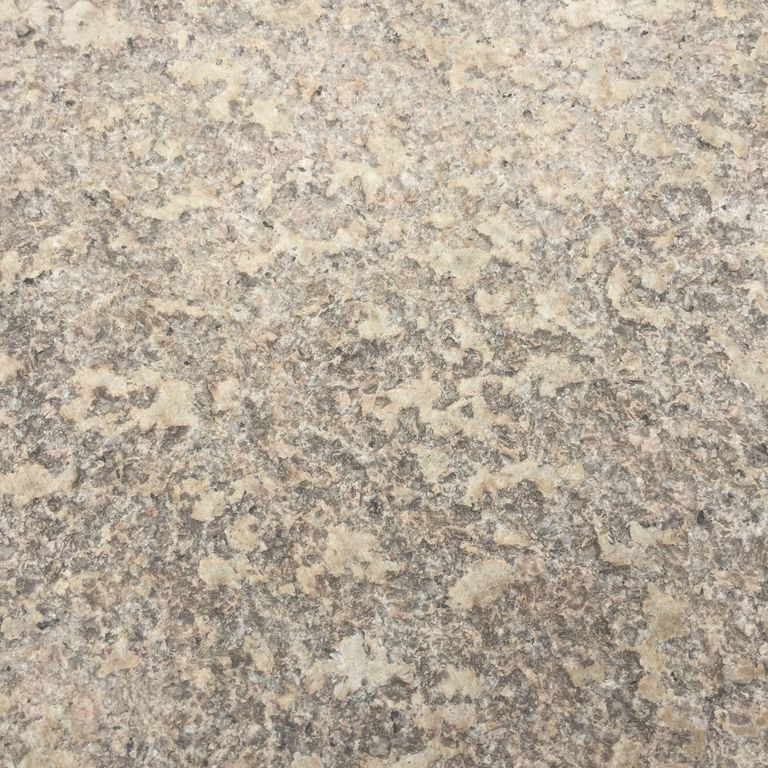 Color/Finish variation image for Granite Plank Pavers - Antiqued Surface. Dominant colors shown are beige and tan; with brown, gray, orange/rust and cream secondaries. The color mix creates a warm feeling. Speckled, blotched and swirled color patterns.