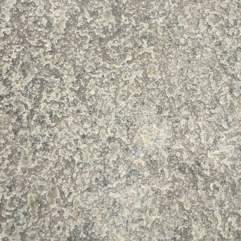 Color/Finish variation image for Granite Plank Pavers - Antiqued Surface. Dominant colors shown are beige and gray; with white, tan and cream secondaries. The color mix creates a warm feeling. Speckled, swirled and cloudy color patterns.